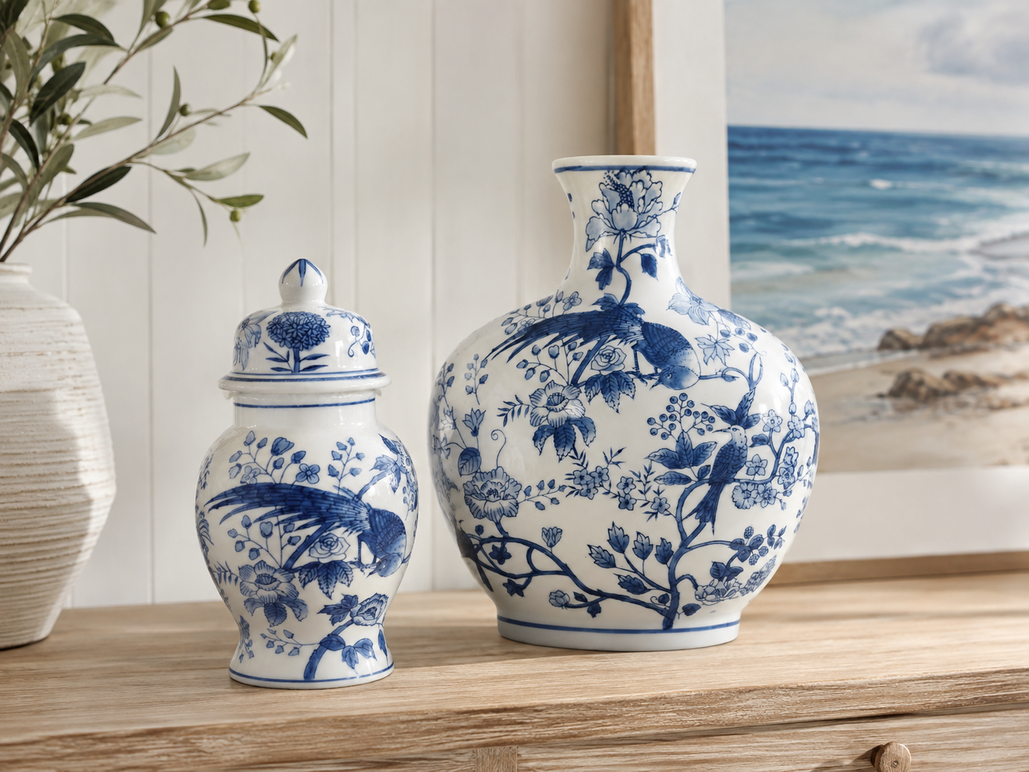 Blue and white ceramic vase and ginger jar set styled on a timber console in a coastal home